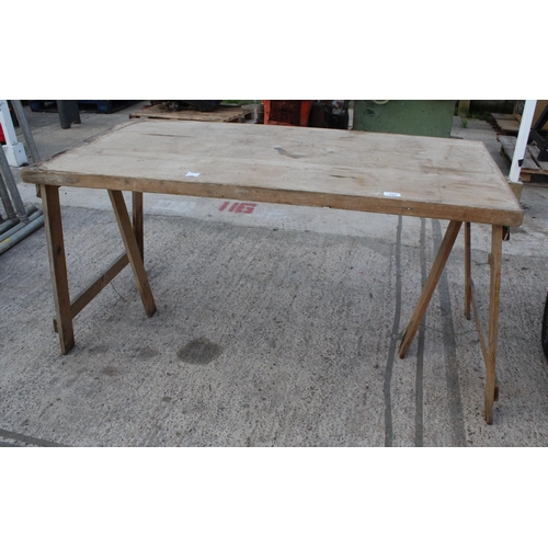 157 - A FOLDING WOODEN TABLE  NO  VAT