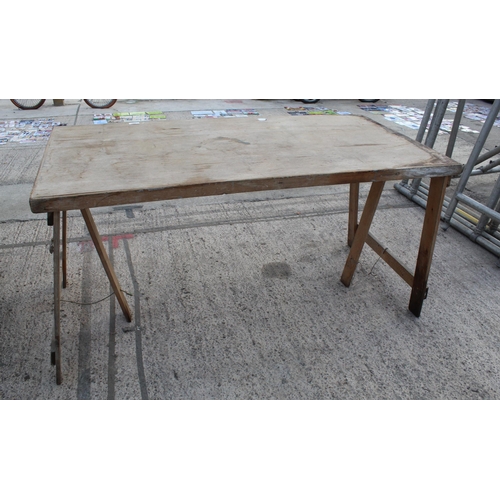 157 - A FOLDING WOODEN TABLE  NO  VAT