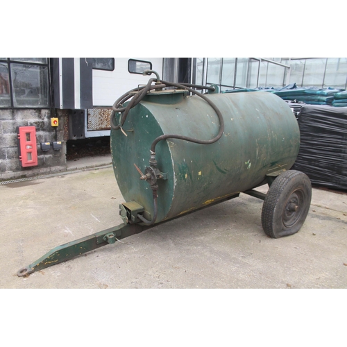 253 - A GREEN METAL SINGLE AXLE TRAILED BOWSER NO VAT