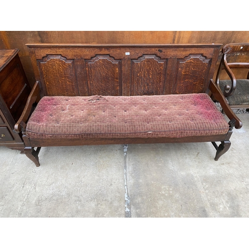 2527 - A GEORGE III OAK SETTLE WITH FOUR PANEL BACK, 72