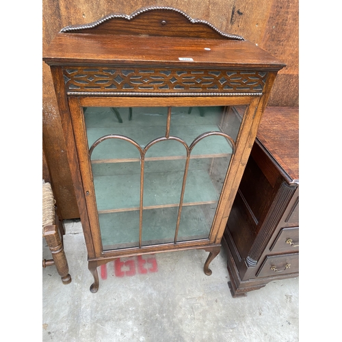 2529 - AN EARLY 20TH CENTURY OAK DISPLAY CABINET ON CABRIOLE LEGS, 26.5