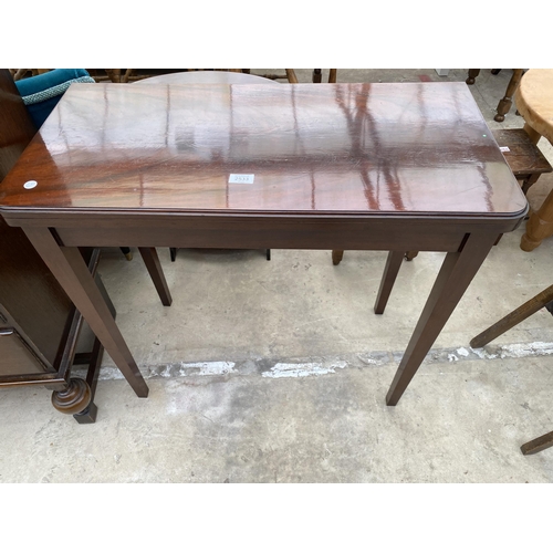 2533 - A 19TH CENTURY STYLE MAHOGANY FOLD OVER GAMES TABLE WITH GREEN BAIZE BEARING LABEL RALPH JOHNSON, CA... 