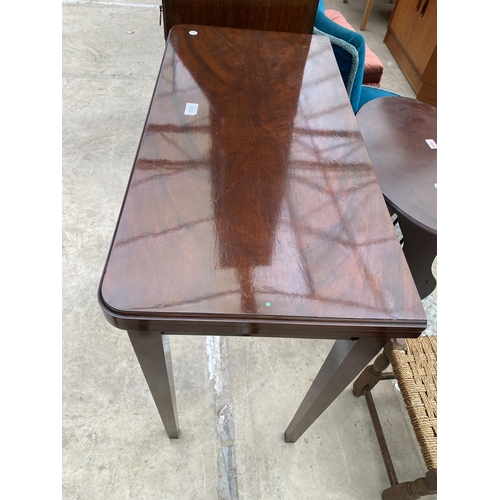 2533 - A 19TH CENTURY STYLE MAHOGANY FOLD OVER GAMES TABLE WITH GREEN BAIZE BEARING LABEL RALPH JOHNSON, CA... 