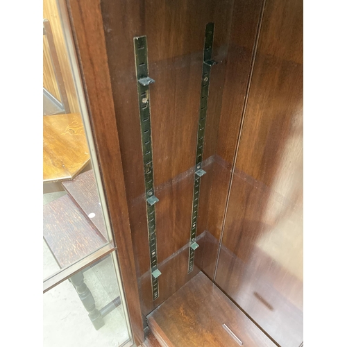 2535 - A MID 20TH CENTURY MAHOGANY GLAZED BOOKCASE ON CABRIOLE LEGS, 43