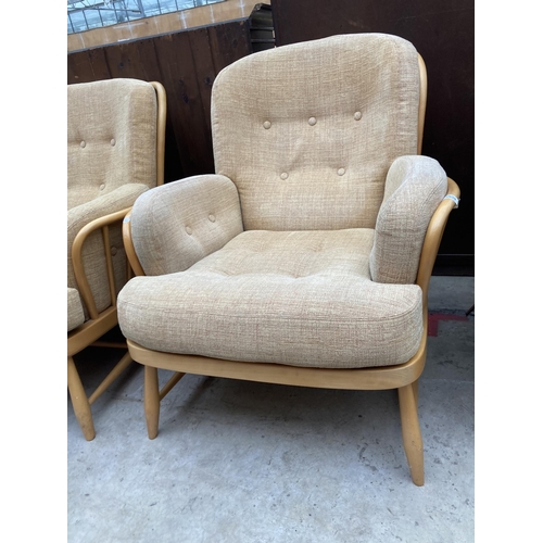 2539 - AN ERCOL JUBILEE THREE PIECE SUITE COMPRISING THREE SEATER SETTEE AND TWO EASY CHAIRS