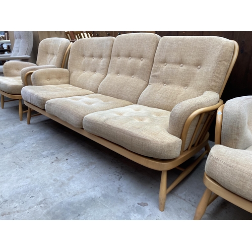 2539 - AN ERCOL JUBILEE THREE PIECE SUITE COMPRISING THREE SEATER SETTEE AND TWO EASY CHAIRS