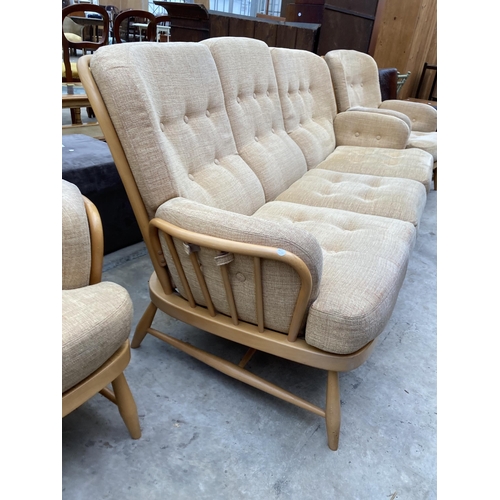 2539 - AN ERCOL JUBILEE THREE PIECE SUITE COMPRISING THREE SEATER SETTEE AND TWO EASY CHAIRS