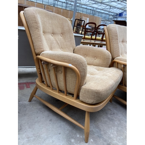 2539 - AN ERCOL JUBILEE THREE PIECE SUITE COMPRISING THREE SEATER SETTEE AND TWO EASY CHAIRS