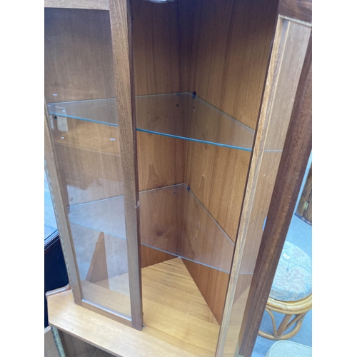 2551 - A TURNIDGE (LONDON) RETRO TEAK CORNER CUPBOARD WITH GLAZED UPPER PORTION, 34