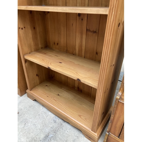 2555 - A PINE FOUR TIER OPEN BOOKCASE, 21