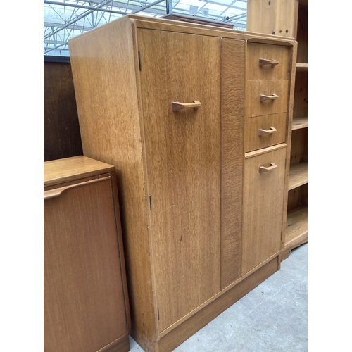 2556 - A G PLAN E GOMME OAK TALLBOY ENCLOSING THREE DRAWERS, ONE CUPBOARD AND ONE HANGING SECTION, 35