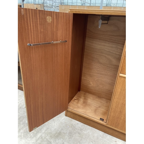 2556 - A G PLAN E GOMME OAK TALLBOY ENCLOSING THREE DRAWERS, ONE CUPBOARD AND ONE HANGING SECTION, 35