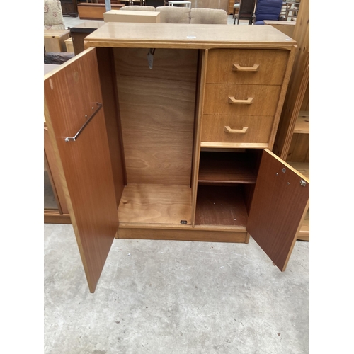 2556 - A G PLAN E GOMME OAK TALLBOY ENCLOSING THREE DRAWERS, ONE CUPBOARD AND ONE HANGING SECTION, 35