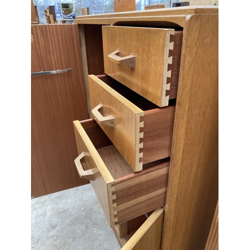 2556 - A G PLAN E GOMME OAK TALLBOY ENCLOSING THREE DRAWERS, ONE CUPBOARD AND ONE HANGING SECTION, 35