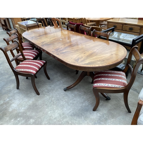 2559 - A REGENCY STYLE MAHOGANY TWIN PEDESTAL EXTENDING DINING TABLE, 63