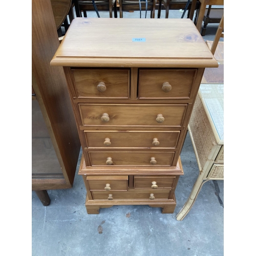 2561 - A PINE CHEST ON CHEST ENCLOSING EIGHT DRAWERS, 18