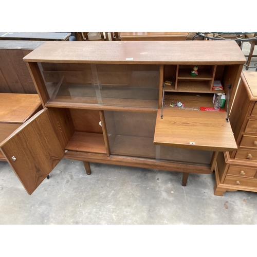 2562 - A RETRO TEAK BUREAU BOOKCASE WITH GLASS SLIDING DOORS, 48