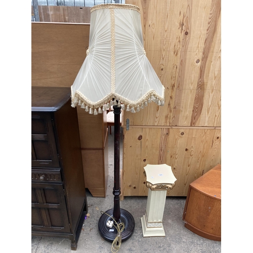 2571 - A STANDARD LAMP WITH SHADE