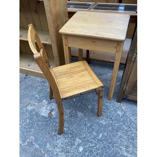 2574 - A MID 20TH CENTURY CHILDS DESK AND CHAIR