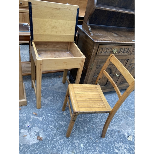 2574 - A MID 20TH CENTURY CHILDS DESK AND CHAIR