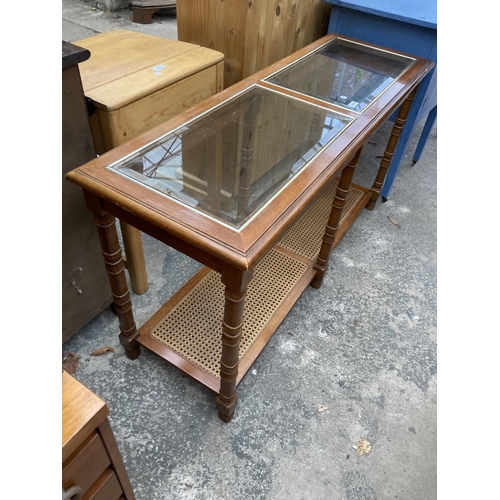 2579 - A HARDWOOD TABLE WITH INSET GLASS TOP AND SPLIT CANE 2ND TIER, 50