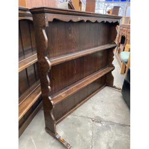 2586 - TWO OAK DRESSER RACKS