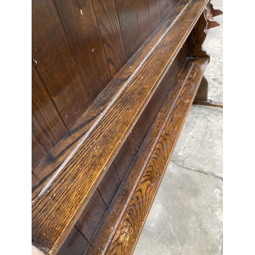 2586 - TWO OAK DRESSER RACKS