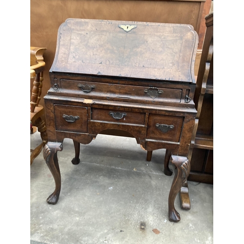 2587 - AN EARLY 20TH CENTURY WALNUT AND CROSSBANDED BUREAU ON CABRIOLE LEGS, 26.5