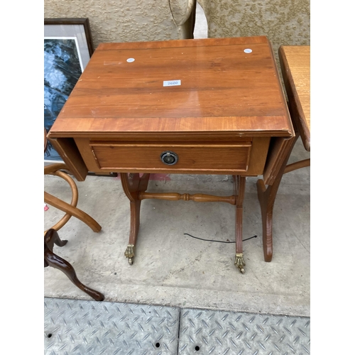 2600 - A MINIATURE YEW WOOD SOFA TABLE