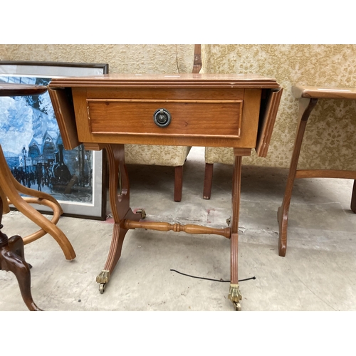 2600 - A MINIATURE YEW WOOD SOFA TABLE