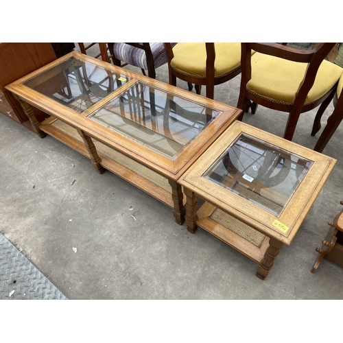 2626 - A HARDWOOD COFFEE TABLE WITH INSET GLASS TOP, 51