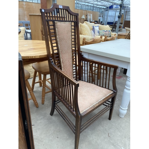 2633 - A HIGH BACK UPHOLSTERED ARMCHAIR IN THE RENNIE MACKINTOCH STYLE WITH TALL BACK AND MULTIPLE SPINDLES