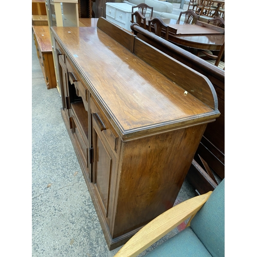 2650 - A VICTORIAN WALNUT SIDEBOARD ENCLOSING THREE DRAWERS, THREE CUPBOARDS AND OPEN SECTION, 60