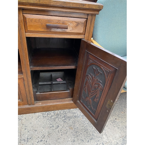 2650 - A VICTORIAN WALNUT SIDEBOARD ENCLOSING THREE DRAWERS, THREE CUPBOARDS AND OPEN SECTION, 60