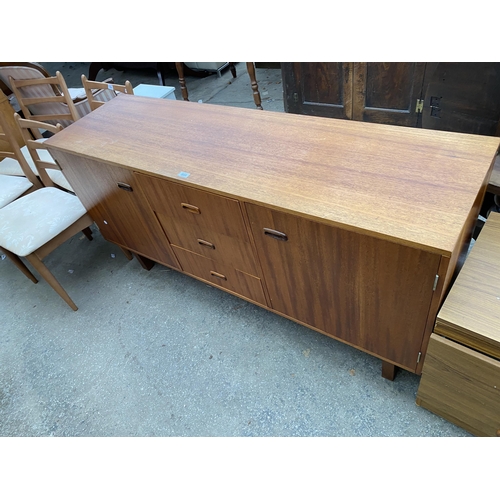 2653 - A RETRO TEAK SIDEBOARD ENCLOSING THREE DRAWERS AND THREE CUPBOARDS, 63