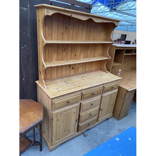 2656 - A PINE DRESSER ENCLOSING SIX DRAWERS, TWO CUPBOARDS AND PLATE RACK, 55.5