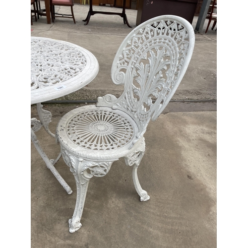 1501 - A WHITE CAST ALLOY BISTRO SET COMPRISING OF A ROUND TABLE AND TWO CHAIRS