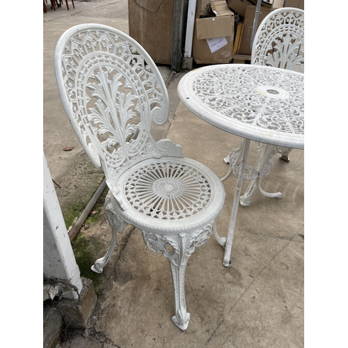 1501 - A WHITE CAST ALLOY BISTRO SET COMPRISING OF A ROUND TABLE AND TWO CHAIRS