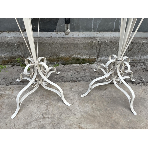 1502 - A PAIR OF DECORATIVE WHITE PAINTED METAL PLANT STANDS