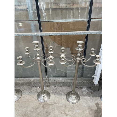 1509 - A PAIR OF DECORATIVE FIVE BRANCH CANDELABRAS