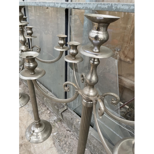 1509 - A PAIR OF DECORATIVE FIVE BRANCH CANDELABRAS