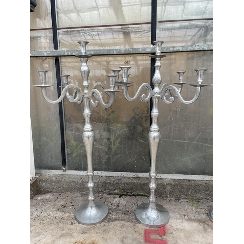 1513 - A PAIR OF DECORATIVE FIVE BRANCH CANDELABRAS