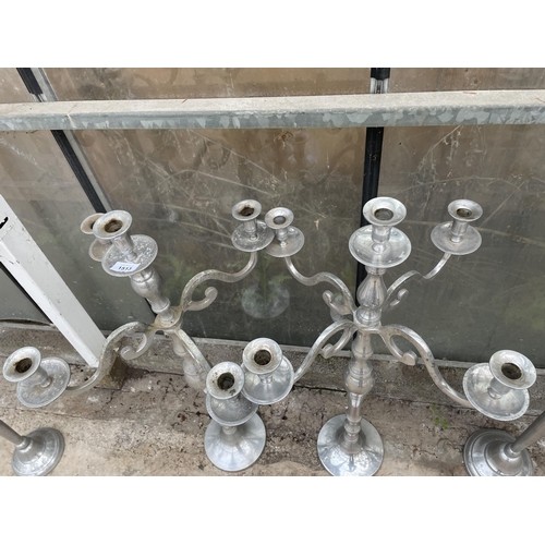 1513 - A PAIR OF DECORATIVE FIVE BRANCH CANDELABRAS