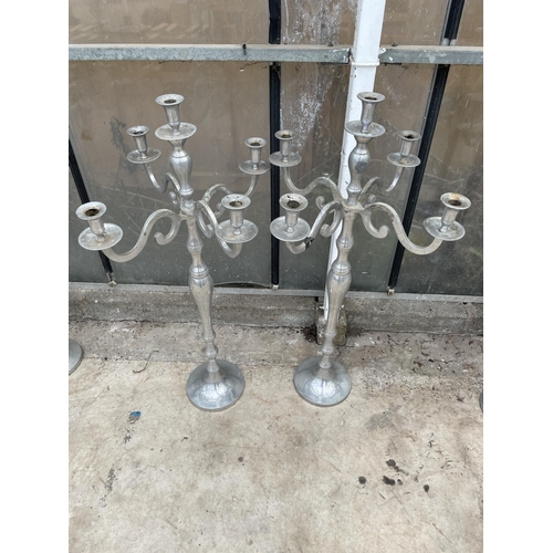 1515 - A PAIR OF DECORATIVE FIVE BRANCH CANDELABRAS