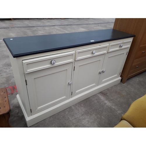 2697 - A PAINTED PINE SIDEBOARD WITH THREE DRAWERS AND THREE CUPBOARDS WITH NOVELTY ADVERTISING KNOBS, 60