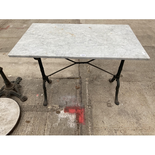 1710 - A DECORATIVE CAST IRON AND MARBLE TABLE