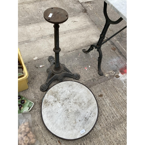 1711 - A CIRCULAR MARBLE TOPPED TABLE WITH DECORATIVE CAST IRON BASE