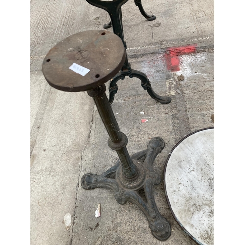 1711 - A CIRCULAR MARBLE TOPPED TABLE WITH DECORATIVE CAST IRON BASE