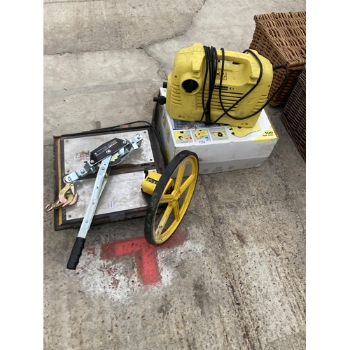 1714 - AN ASSORTMENT OF ITEMS TO INCLUDE A HAND WINCH, A KARCHER PRESSURE WASHER AND AN ELECTRIC TILE CUTTE... 