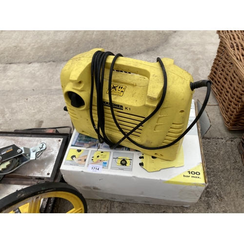 1714 - AN ASSORTMENT OF ITEMS TO INCLUDE A HAND WINCH, A KARCHER PRESSURE WASHER AND AN ELECTRIC TILE CUTTE... 